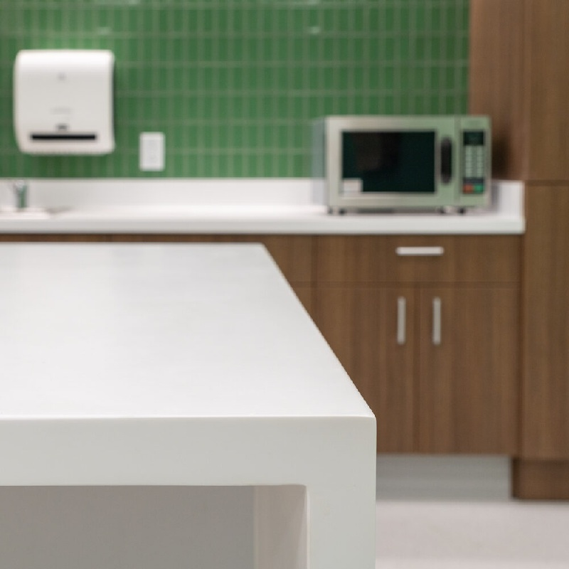 White Corian countertop in a breakroom